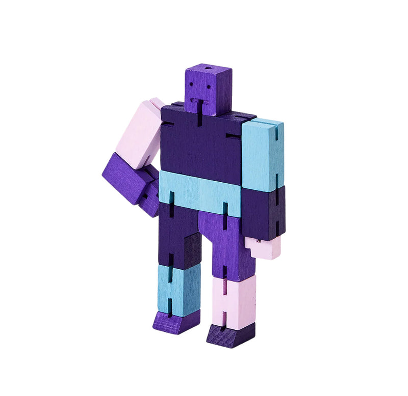 A multicolor purple humanoid block figure made of wood. 