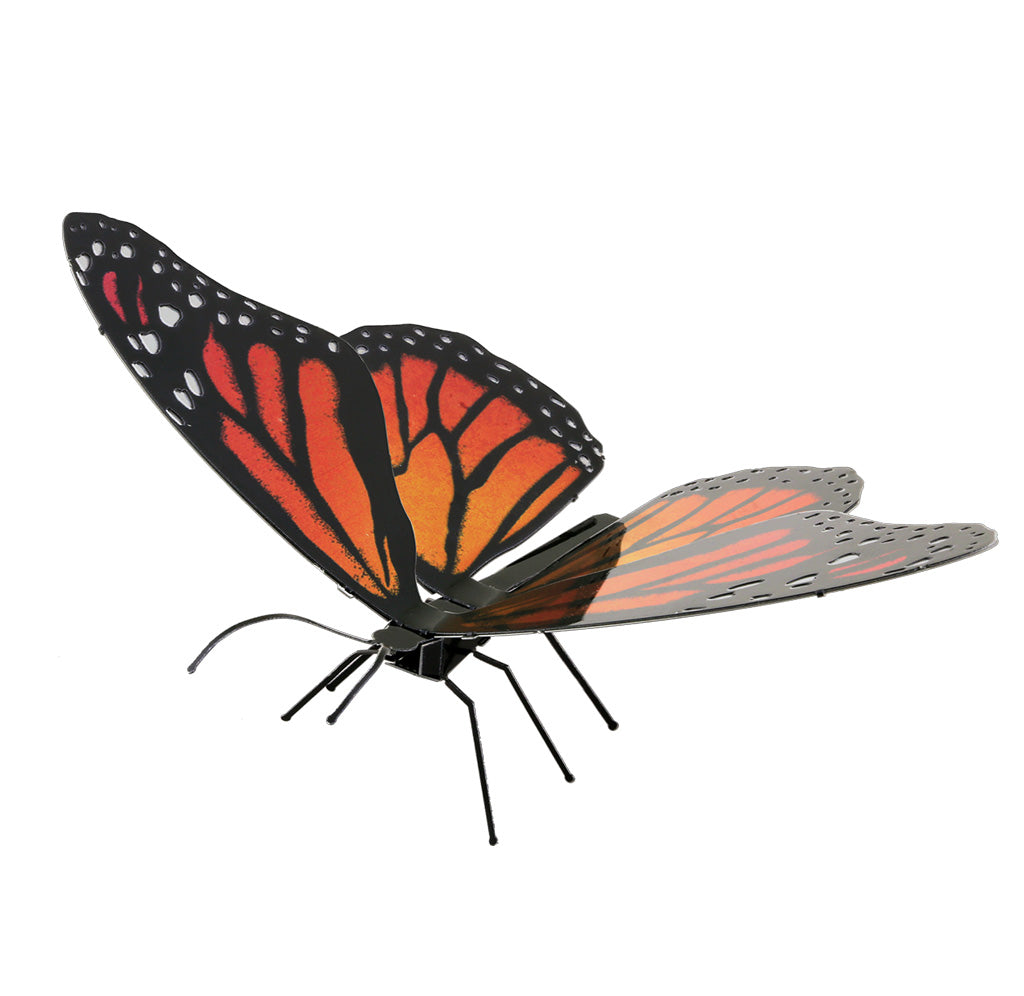 An orange and black butterfly made of metal. 