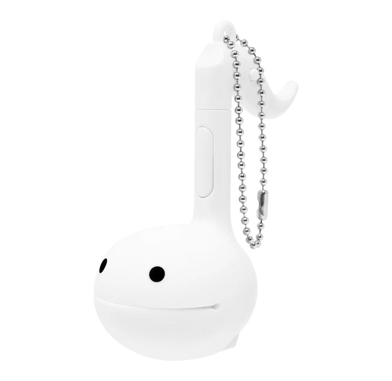 A white music note shaped toy with a metal keychain. 