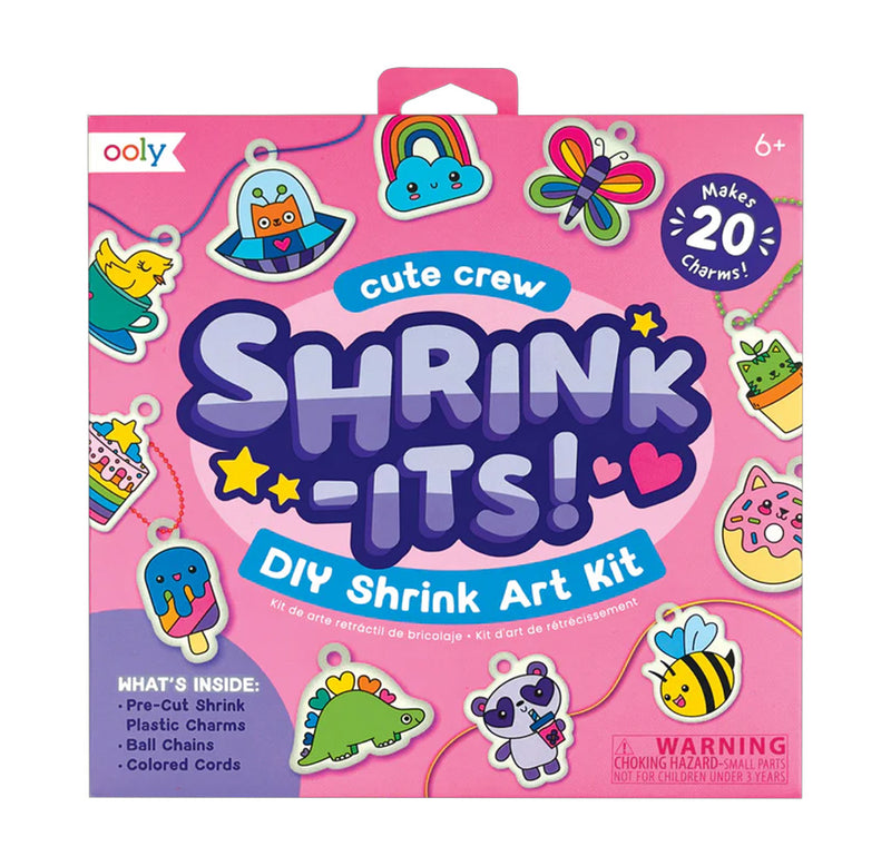 a pink square box with different cartoon charms arranged around the box. The title of the product is large and in the center of the box in purple. 